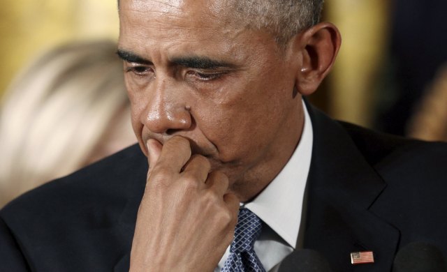 U.S. President Barack Obama reacts while talking about Newtown and other mass killings during an event held to announce new gun control measures at the White House in Washington January 5, 2016.  The White House unveiled gun control measures on Monday that require more gun sellers to get licenses and more gun buyers to undergo background checks, moves Obama said were well within his authority to implement without congressional approval. REUTERS/Kevin Lamarque