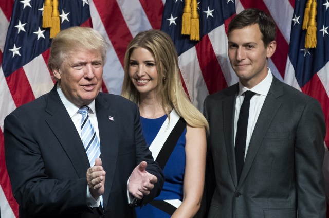 (FILES) This file photo taken on July 16, 2016 shows (from L) Republican presidential candidate Donald Trump, his daughter Ivanka Trump and her husband Jared Kushner standing on stage at the end of an event at the Hilton Midtown Hotel in New York City. Donald Trump on January 9, 2017 named son-in-law Jared Kushner as senior White House advisor, rewarding the man widely credited as the brains behind his election but courting serious legal and ethical concerns. The baby-faced real estate developer and magazine publisher who turns 36 on January 10, will be the youngest top member of the administration, working closely with chief of staff Reince Priebus and chief strategist Steve Bannon. / AFP PHOTO / GETTY IMAGES NORTH AMERICA / Drew Angerer