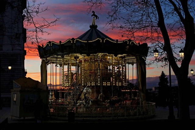 A carousel is seen outside the Royal Palace in Madrid, Spain January 16, 2017. REUTERS/Juan Medina