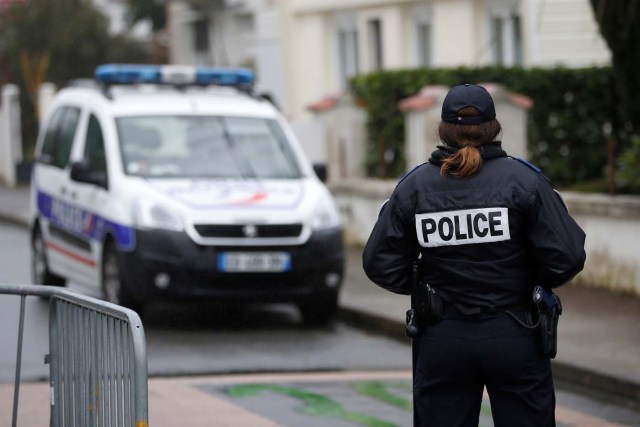 French police secure the streets around the house of the Troadec family in Orvault near Nantes, France, March 1, 2017. The couple and their two children have been missing for nearly two weeks. REUTERS/Stephane Mahe