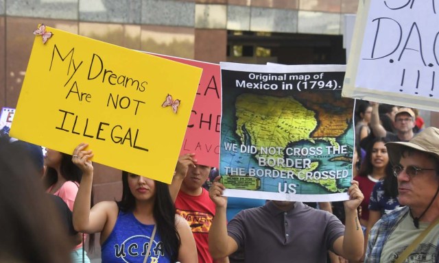 A map of Mexico as it was in 1794 is displayed as young immigrants and their supporters rally in support of Deferred Action for Childhood Arrivals (DACA) in Los Angeles, California on September 1, 2017. A decision is expected in coming days on whether US President Trump will end the program by his predecessor, former President Obama, on DACA which has protected some 800,000 undocumented immigrants, also known as Dreamers, since 2012. / AFP PHOTO / FREDERIC J. BROWN