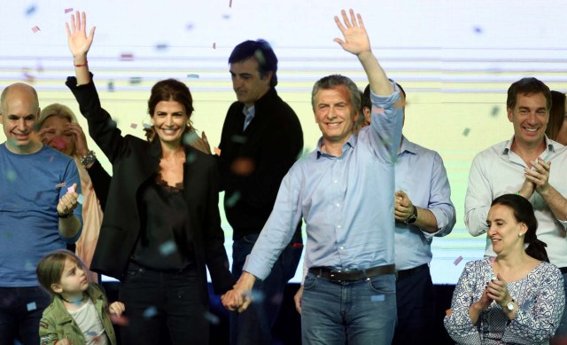 Argentina's President Mauricio Macri, First Lady Juliana Awada and their daughter Antonia celebrate alongside Vice President Gabriela Michetti (R) Buenos Aires' City mayor Horacio Rodriguez Larreta (L) and candidate for the Senate Esteban Bullrich (C, back) at their campaign headquarters in Buenos Aires, Argentina October 22, 2017. REUTERS/Marcos Brindicci