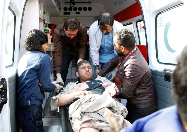 People carry an injured man to a hospital after a blast in Kabul, Afghanistan January 27, 2018.REUTERS/Mohammad Ismail