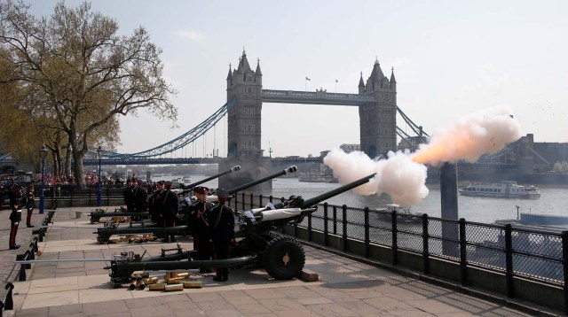 Members of the Honourable Artillery Company fire a 62-gun salute across the River Thames to mark the 92nd birthday of Britain's Queen Elizabeth, at the Tower of London, Britain April 21, 2018. REUTERS/Henry Nicholls